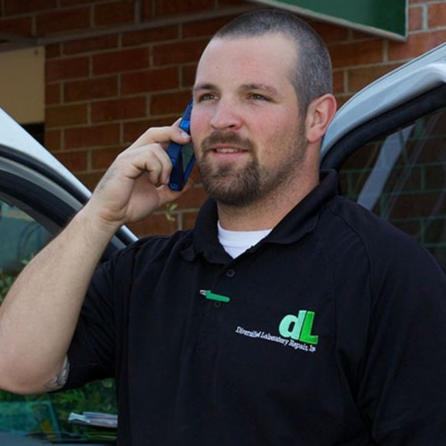 lss-dlr_service-tech-on-phone.JPG