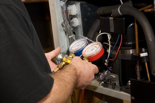 DL Repair tech with gauges